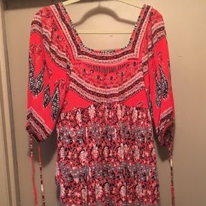 Red blouse with flowers and geometric designs!